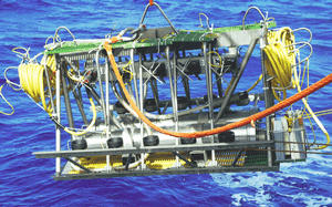 The H2O Junction Box being lowered into the ocean.