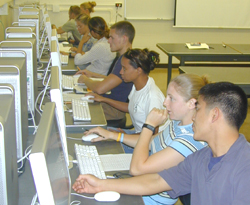 Image of students in the new Mac lab.