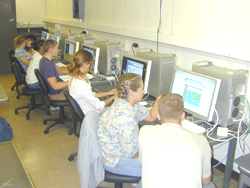 Image of students in the new Mac lab.