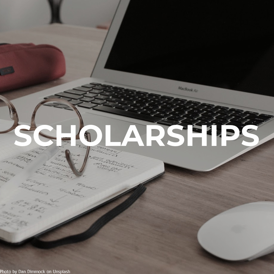 Image of laptop and open notebook with. Text over image says, "Scholarships"