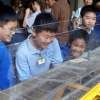 Students watch a wave machine at the SOEST Open House