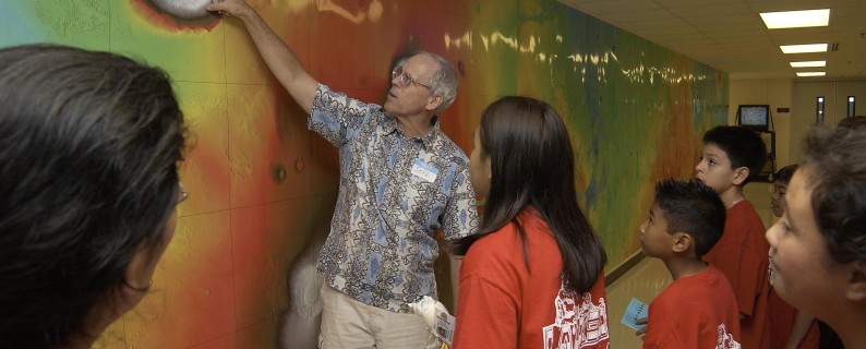 Prof Jeff Taylor, Dir of the Space Grant program, takes some Aliamanu Middle School students on a "Field Trip To Mars" during Open House day. Note the huge map covering the whole hallway.