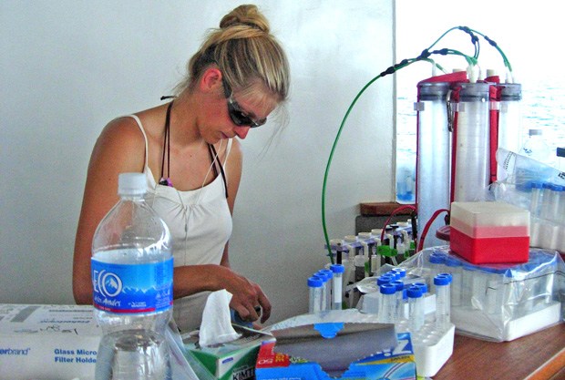 Photo of Katie Barott filtering water