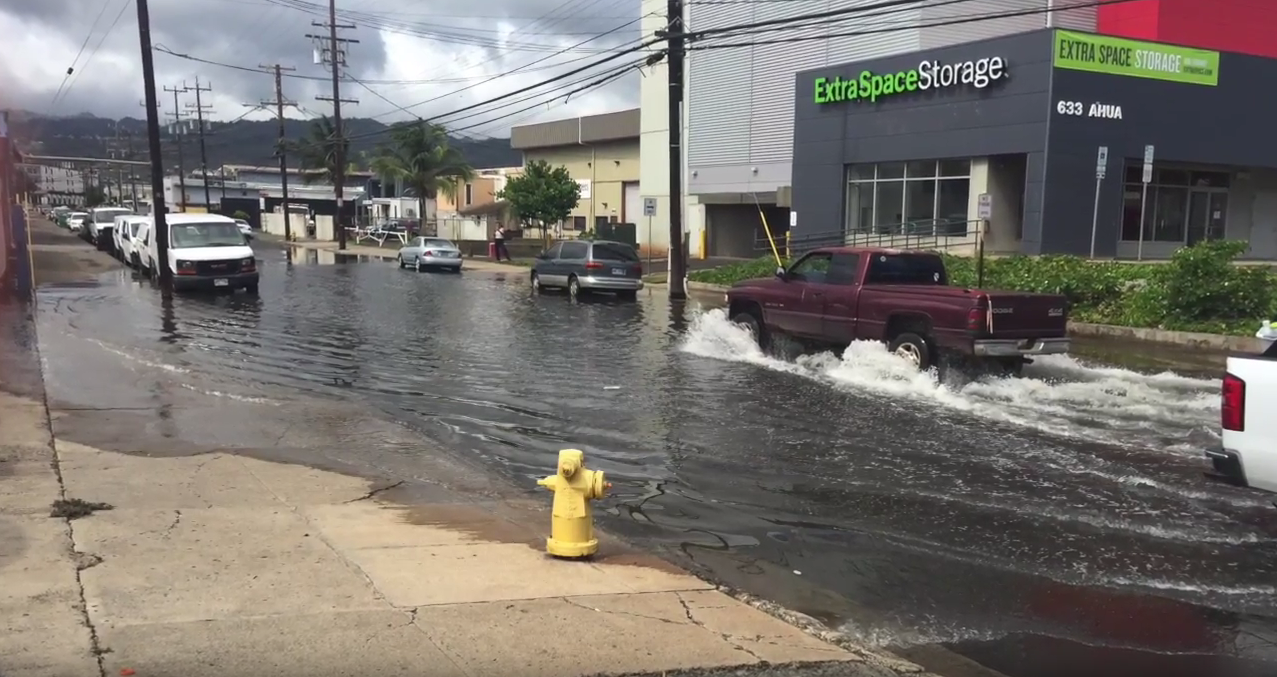 Video still of street flooding.