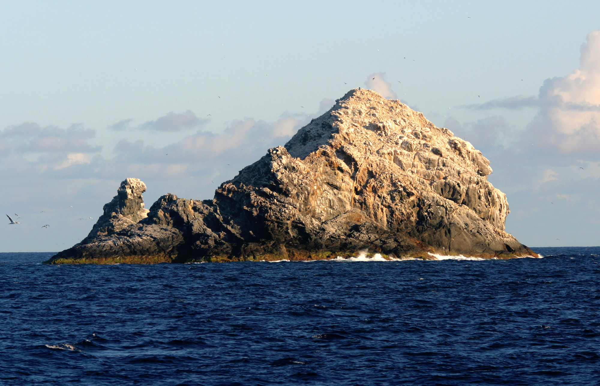 The only remnants of Pūhāhonu that are above sea level (Gardner Pinnacles). Credit: NOAA.
