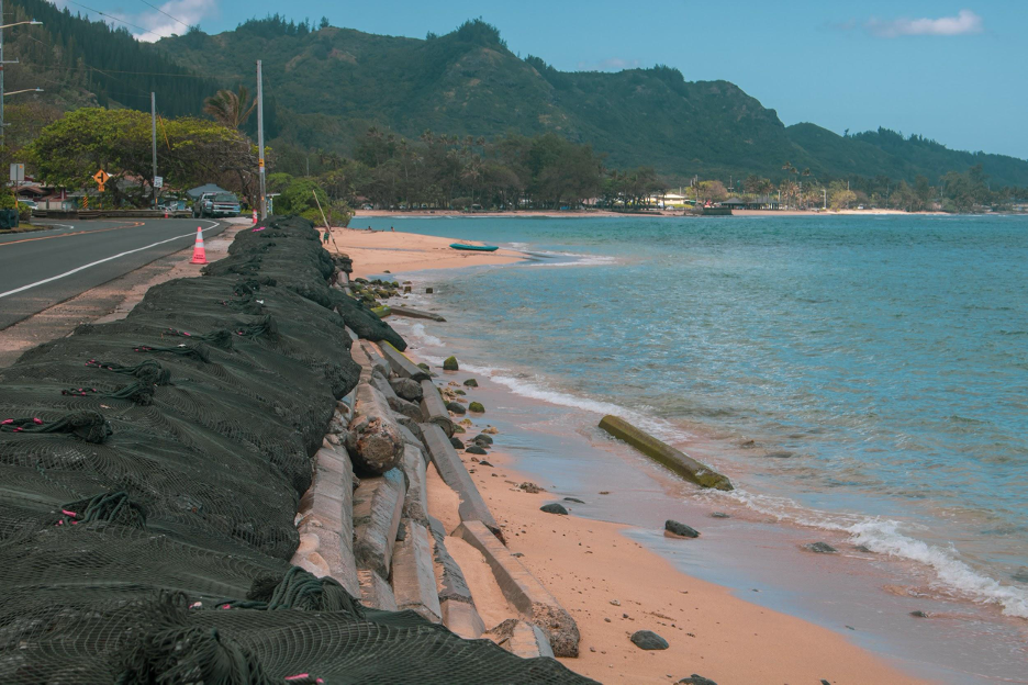 Beachfront transportation on Oʻahu that is protected by shoreline hardening, which has led to beach narrowing and loss in this area.