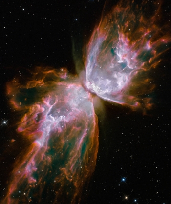 The Butterfly nebula, an example of a star-forming region. A bright central star, obscured by dust, modifies the oxygen isotopes in the nebula by photodissociation of carbon monoxide. This is an example of an environment in which oxygen isotopes could be modified in the molecular cloud prior to formation of a planetary system.