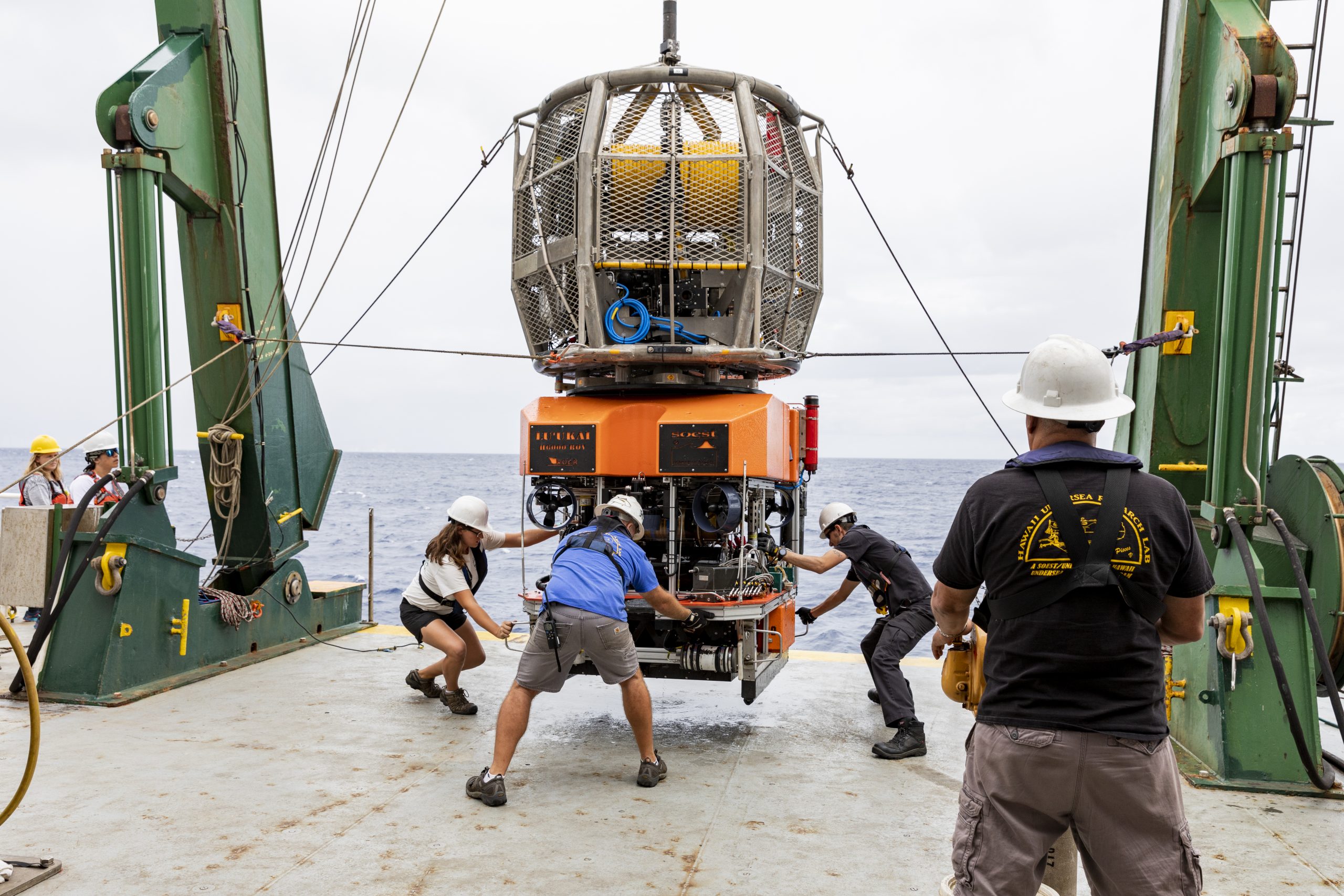 ROV Lu'ukai being recovered on the back deck of research vessel Kilo Moana