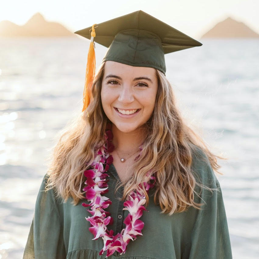 Kayla White in graduation regalia