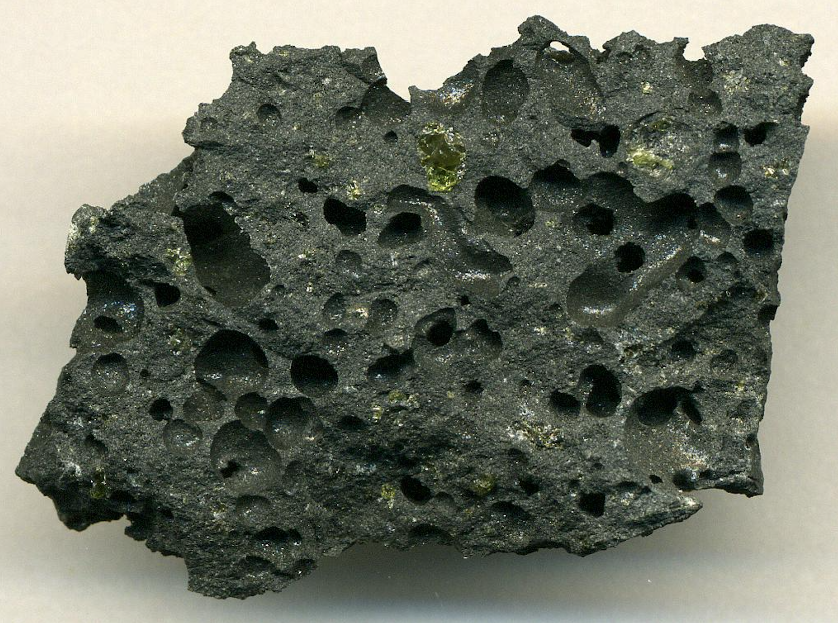 Green olivine in basalt.