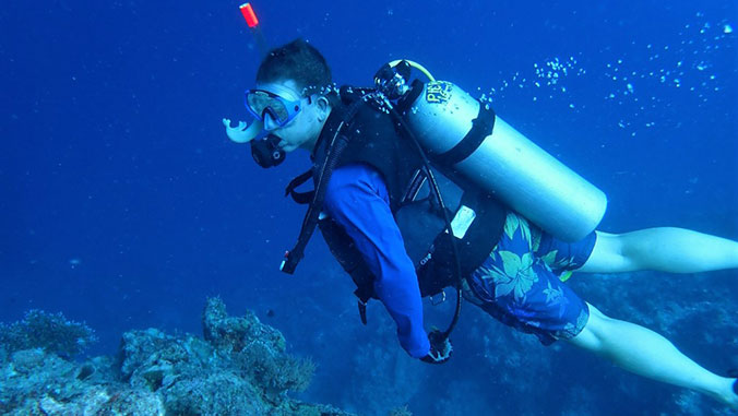 Sabine evaluating a potential deployment site for a mooring in Palau.