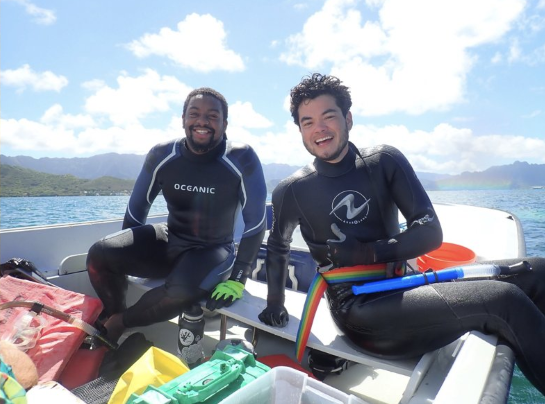 Gyasi Alexander (left) and Shayle Matsuda on a boat