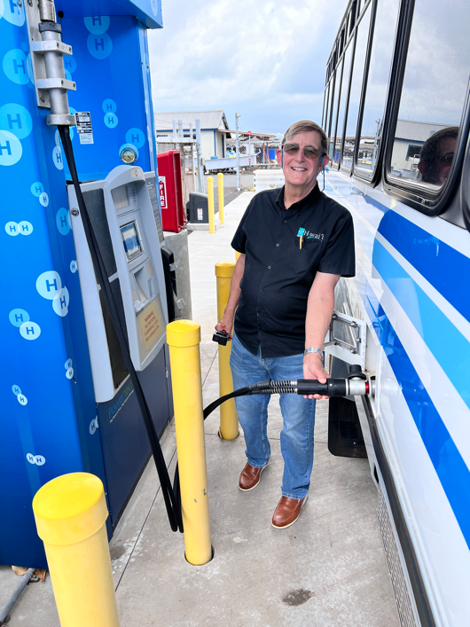 Mitch Ewan, HNEI hydrogen system program manager, at making “first fill” on new hydrogen bus