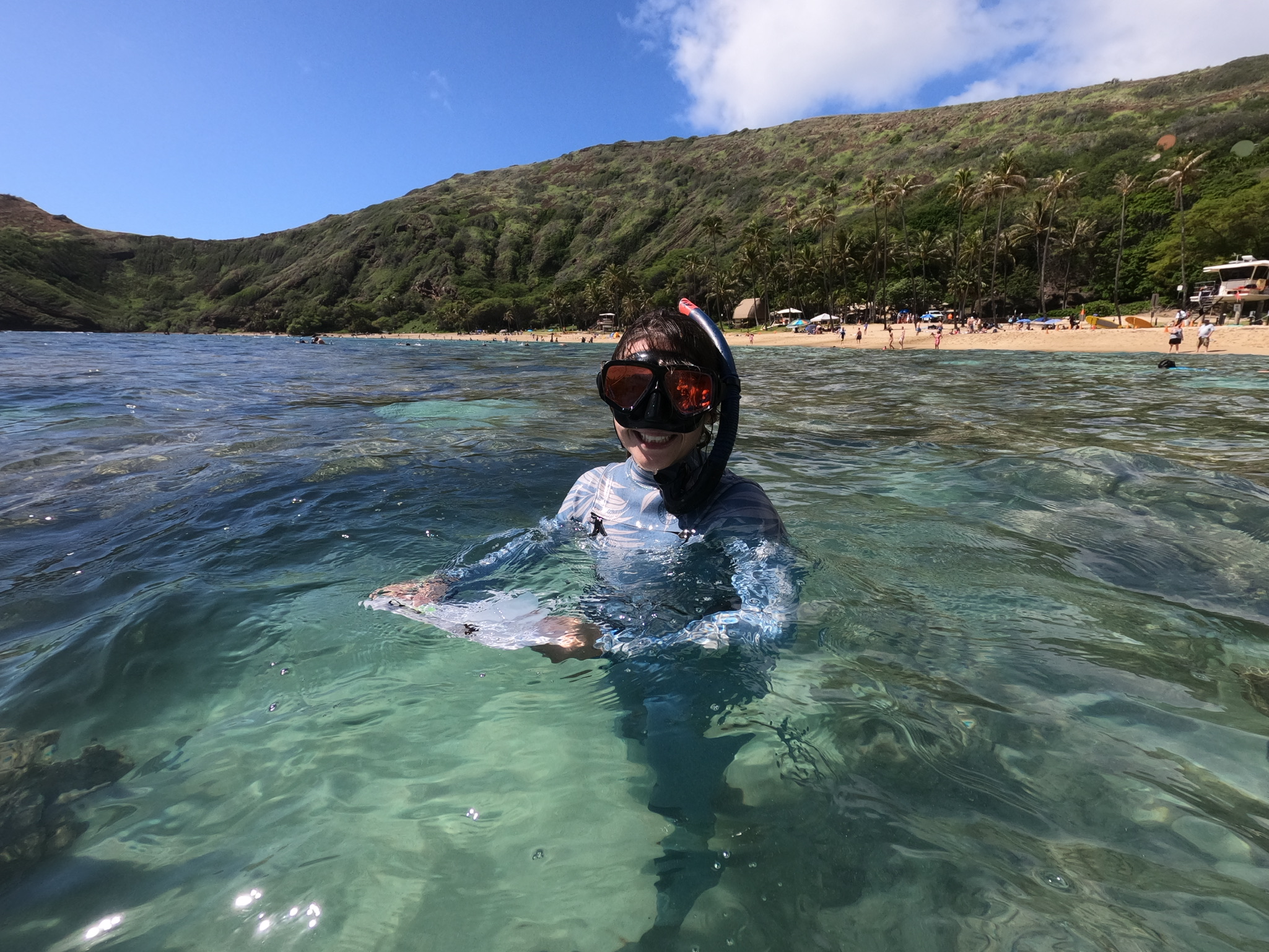 Shannon Murphy conducting at research with snorkel and mask at Hanauma Bay for her senior thesis