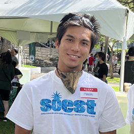 Three students at student fair.