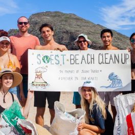 SOEST Club members participating in a beach cleanup
