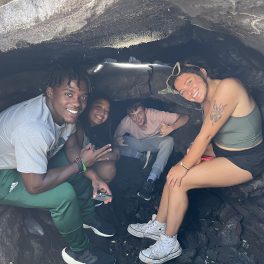 Students in a lava tube. Big Island, Hawaii