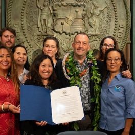 Gov. Josh Green with the UH One Health team at the proclamation signing.