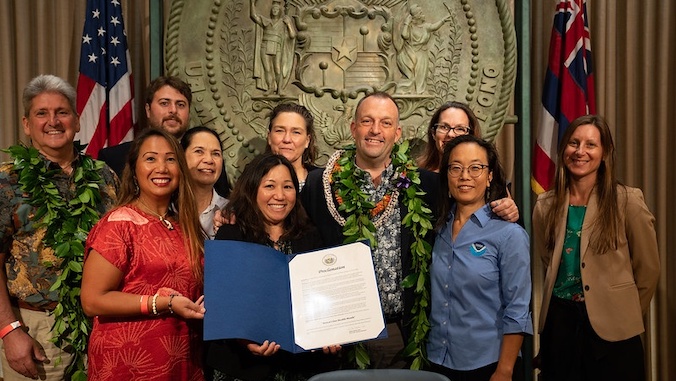 Gov. Josh Green with the UH One Health team at the proclamation signing.