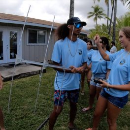 Students practice marine mammal tagging exercise.