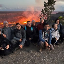 CSAV International Training Course 2023 cohort at Halemaumau during an eruption.