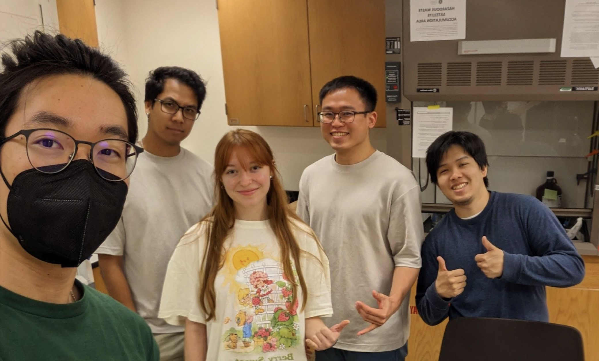 Five Students in the Earth and Planetary Exploration and Technology Certificate program pose together in a lab