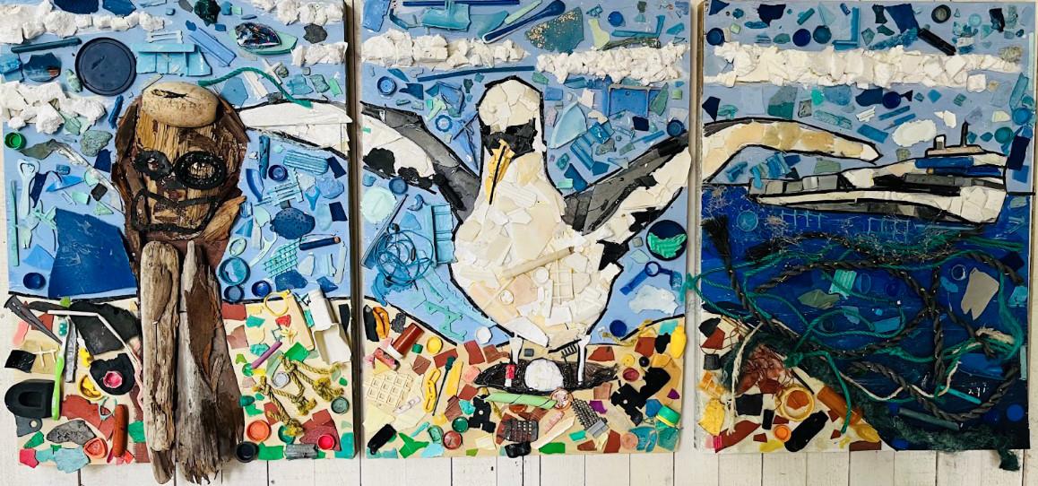 A three panel mosaic art piece, that includes an albatross bird and a ship at sea, is made with marine debris.