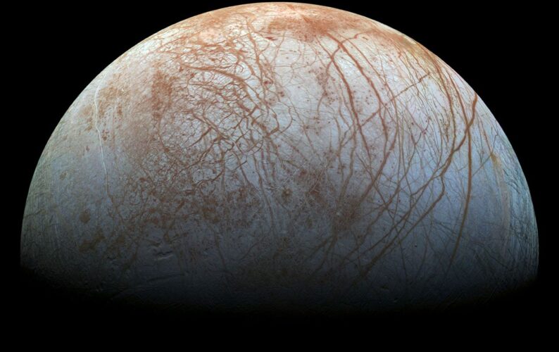 Europa: with lots of rust colored streaking across the light colored surface